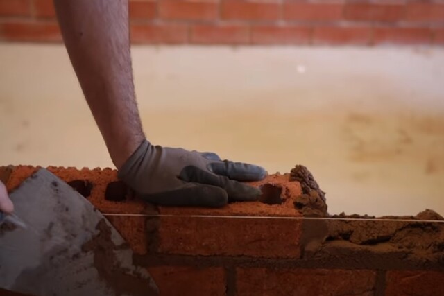 Laying bricks using a line